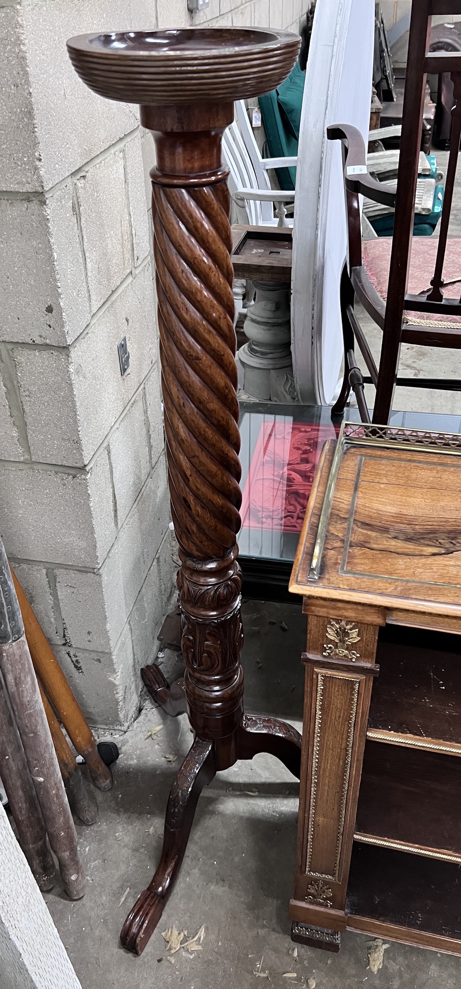 A Victorian style mahogany torchere, height 135cm